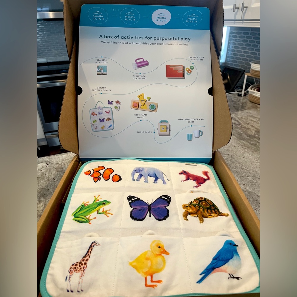 Pre-owned Lovevery play kit. The Realist 19, 20, 21 months.